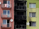 Panelák v plamenech. Město připravuje finanční pomoc